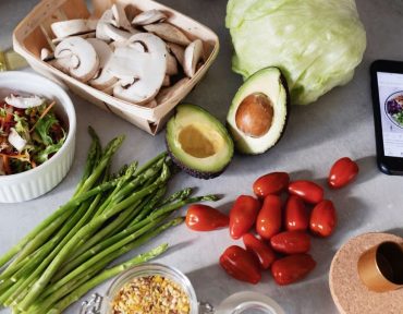 A fresh selection of vegetables and ingredients for preparing a nutritious meal.